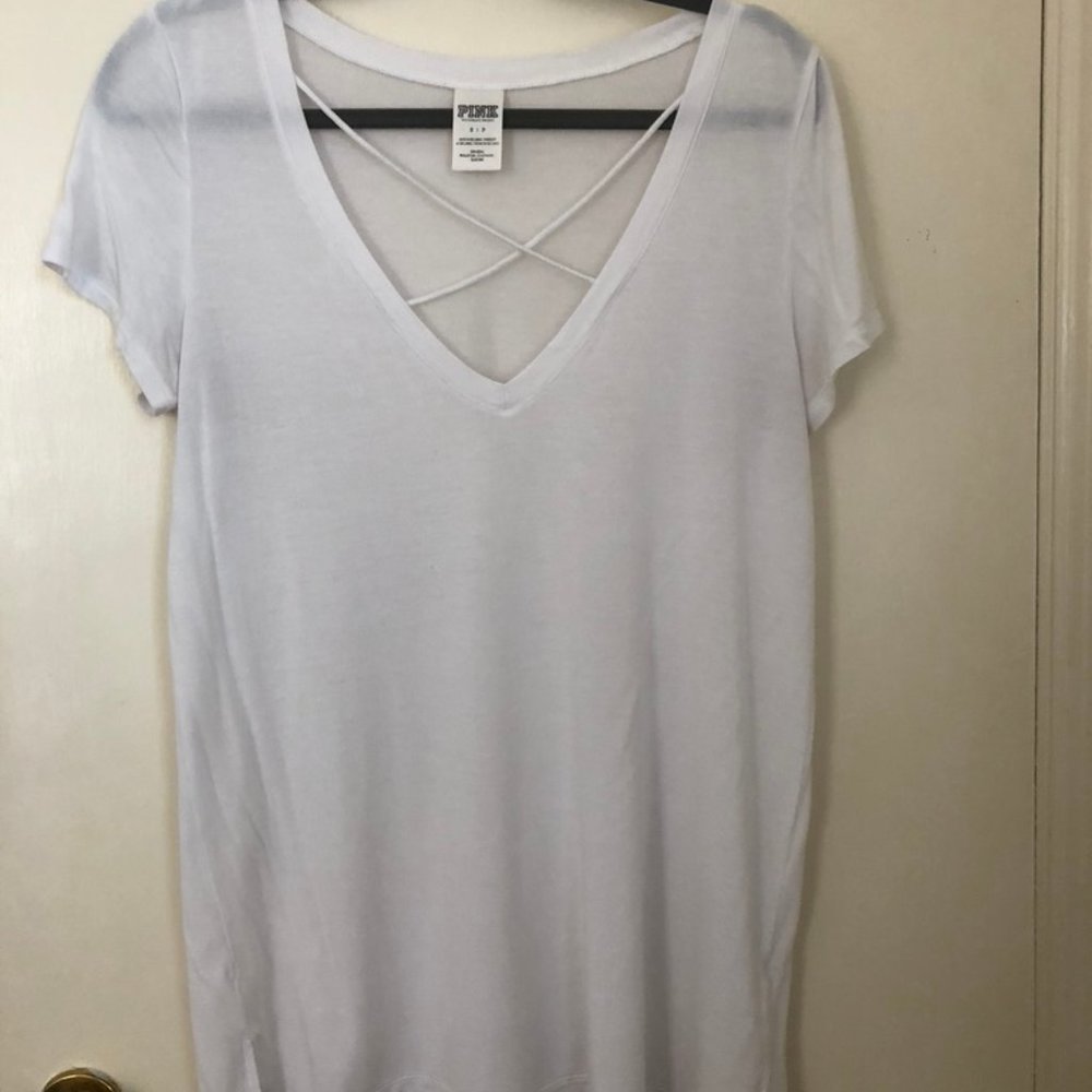White v-neck with criss-cross detail